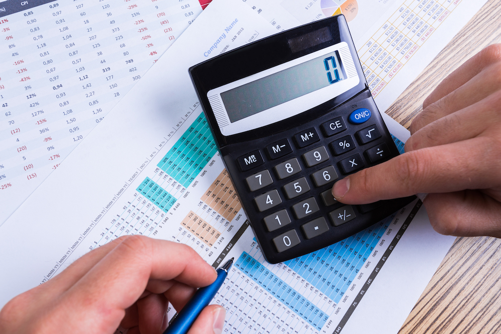 using a calculator to evaluate inventory loss in a liquor store
